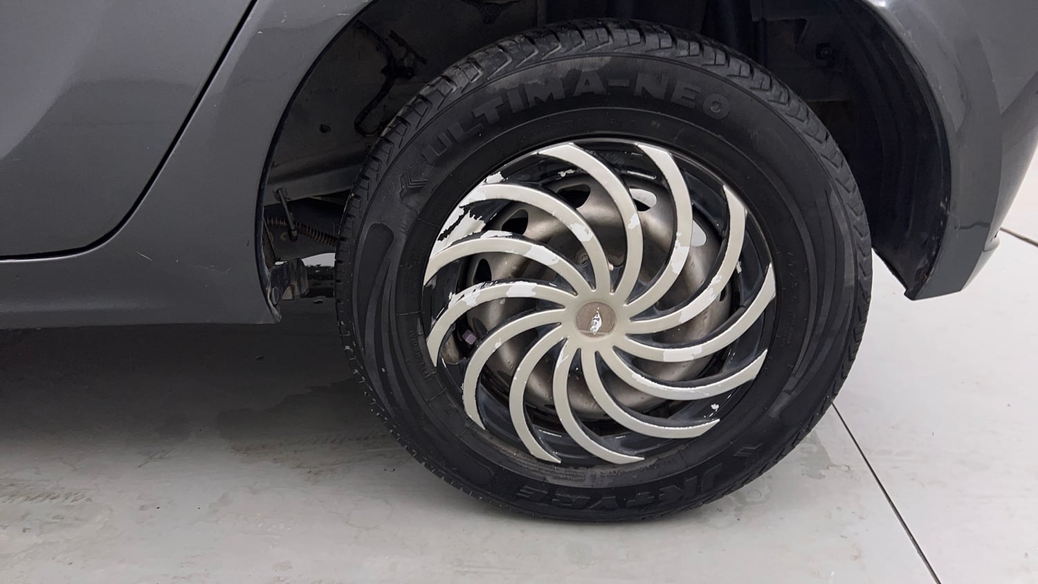 Used 2024 Tata Tiago XE Petrol Manual tyres LEFT REAR TYRE RIM VIEW