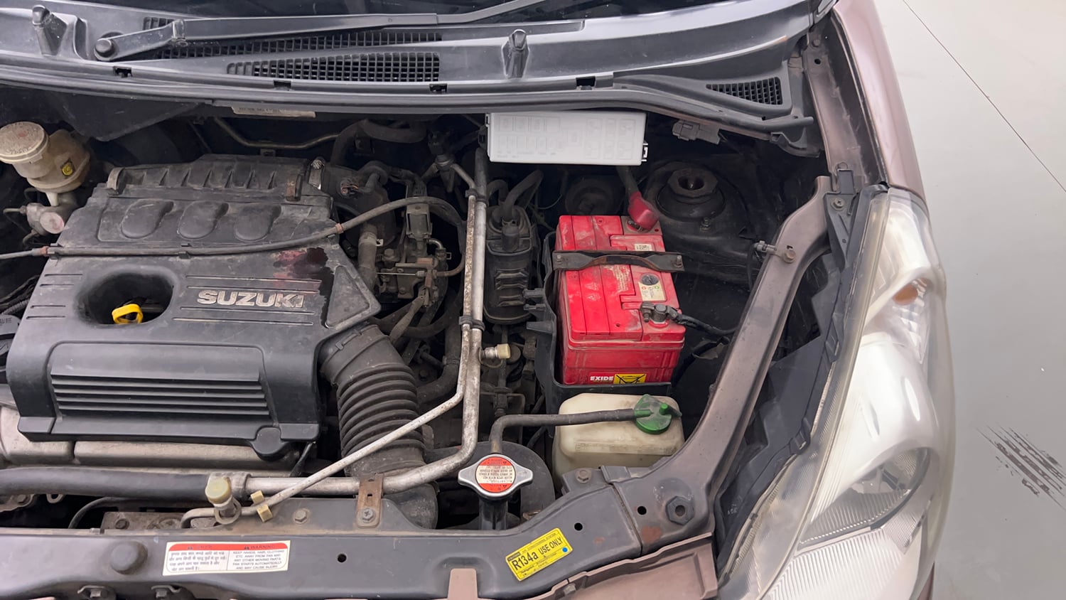 Used 2013 Maruti Suzuki Estilo LXi BS-IV Petrol Manual engine ENGINE LEFT SIDE VIEW