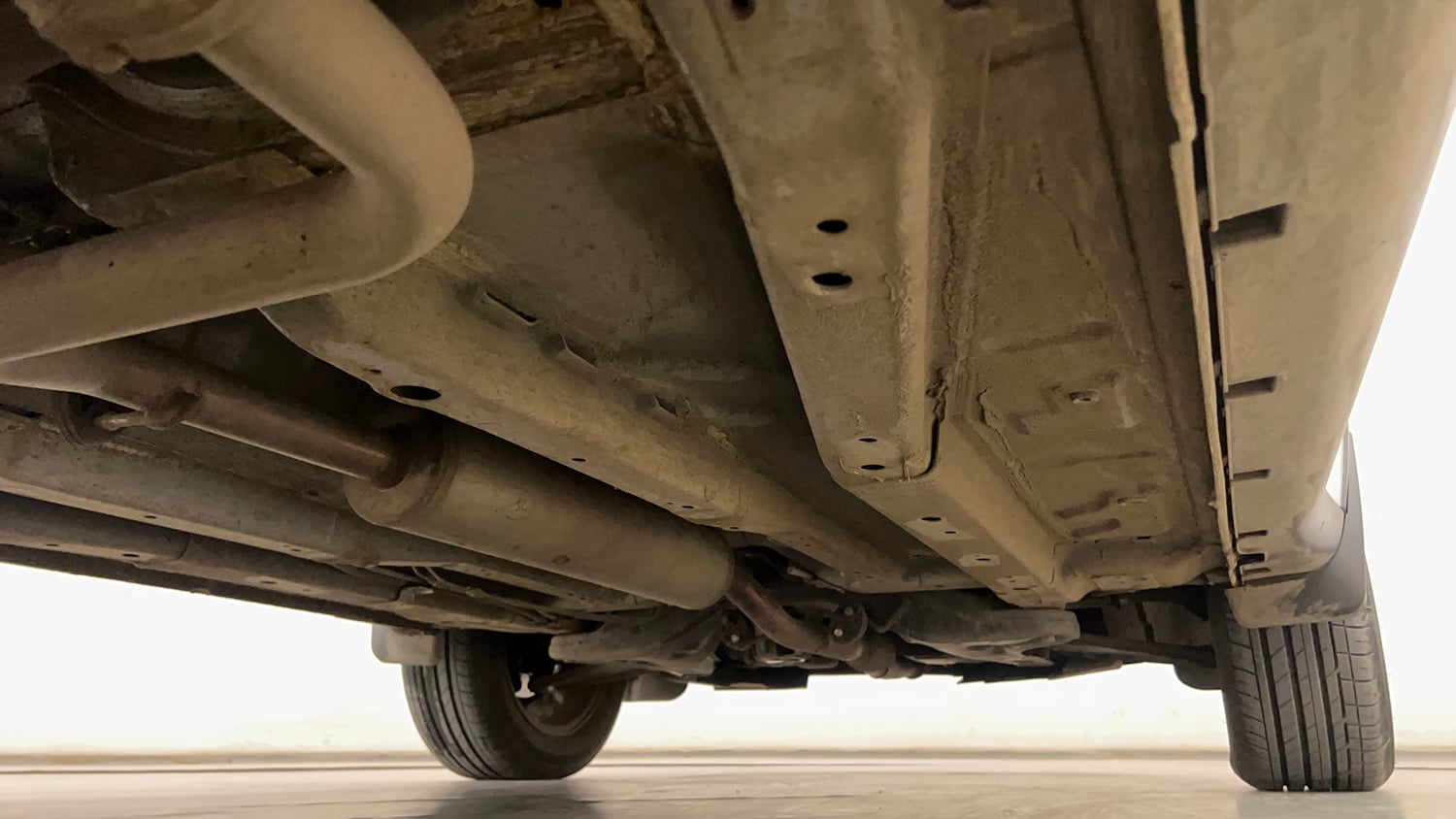 Used 2024 Tata Nexon Creative Plus S 1.2 Revotron Petrol 7DCA Petrol Automatic extra REAR RIGHT UNDERBODY VIEW