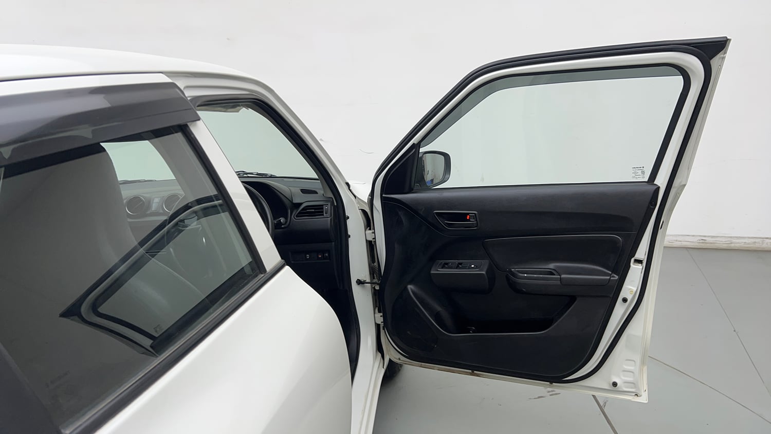 Used 2022 Maruti Suzuki Swift LXi Petrol Manual interior RIGHT FRONT DOOR OPEN VIEW