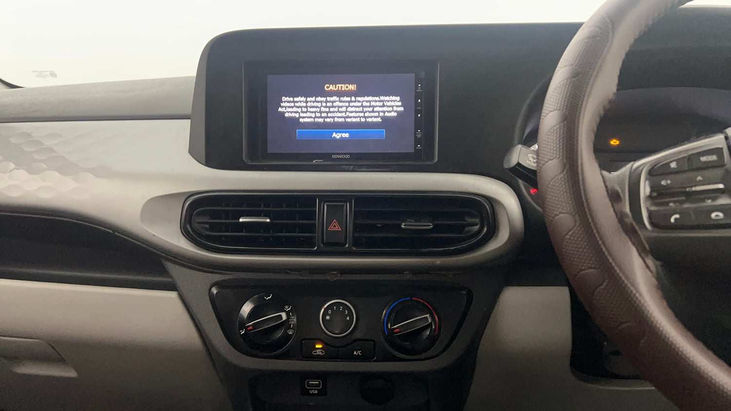 Used 2021 Hyundai Grand i10 Nios Magna Corporate Edition 1.2 Kappa VTVT Petrol Manual interior MUSIC SYSTEM & AC CONTROL VIEW