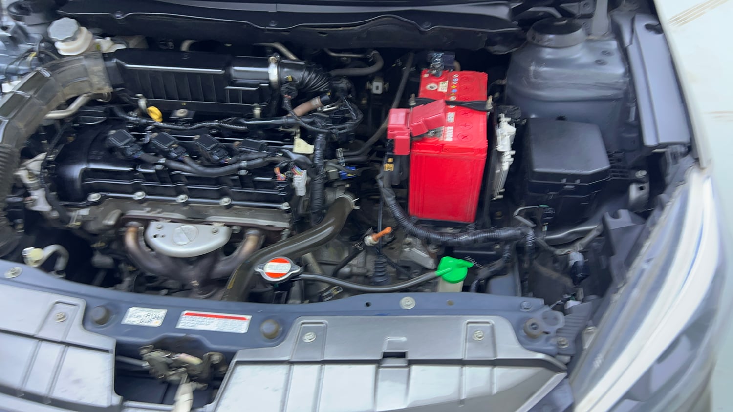 Used 2019 Maruti Suzuki Ciaz Alpha Hybrid 1.5 AT Petrol Automatic engine ENGINE LEFT SIDE VIEW