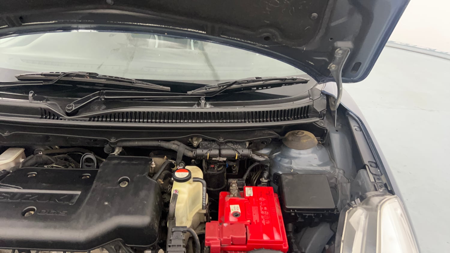 Used 2017 Maruti Suzuki Baleno Delta 1.3 Diesel Manual engine ENGINE LEFT SIDE HINGE & APRON VIEW