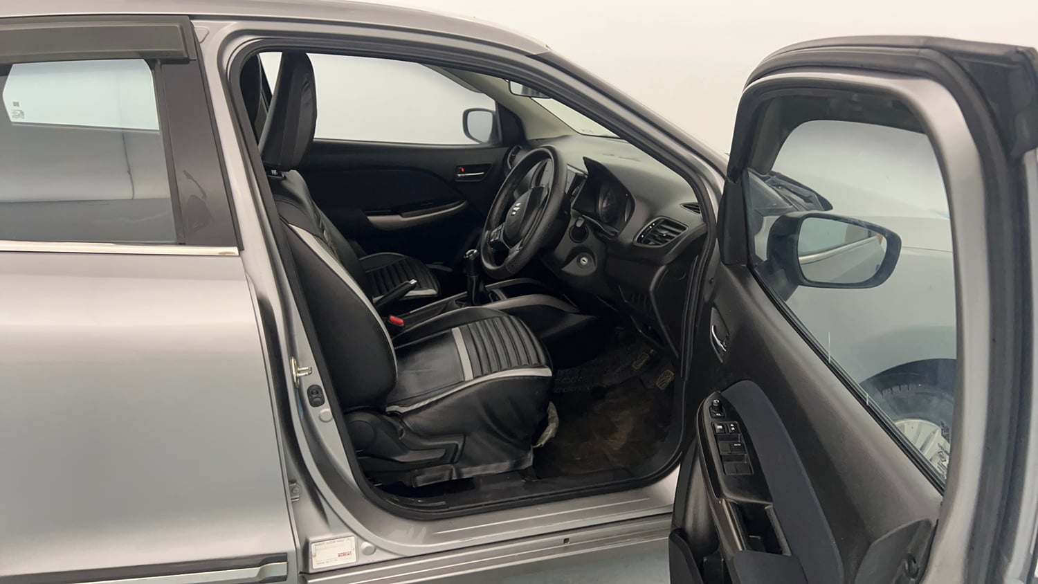 Used 2022 Maruti Suzuki Baleno Delta Petrol Manual interior RIGHT SIDE FRONT DOOR CABIN VIEW