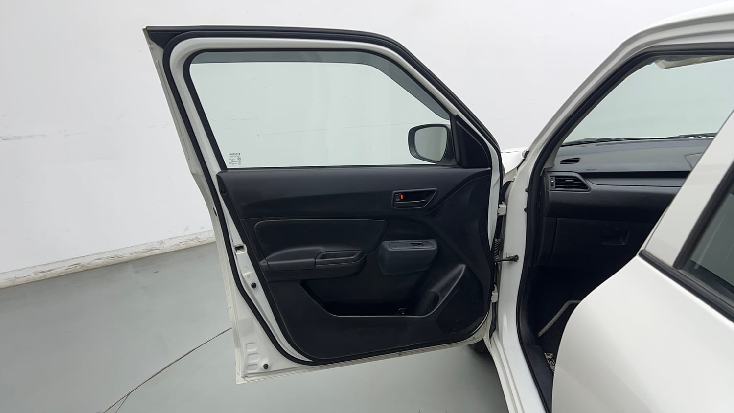 Used 2022 Maruti Suzuki Swift LXi Petrol Manual interior LEFT FRONT DOOR OPEN VIEW