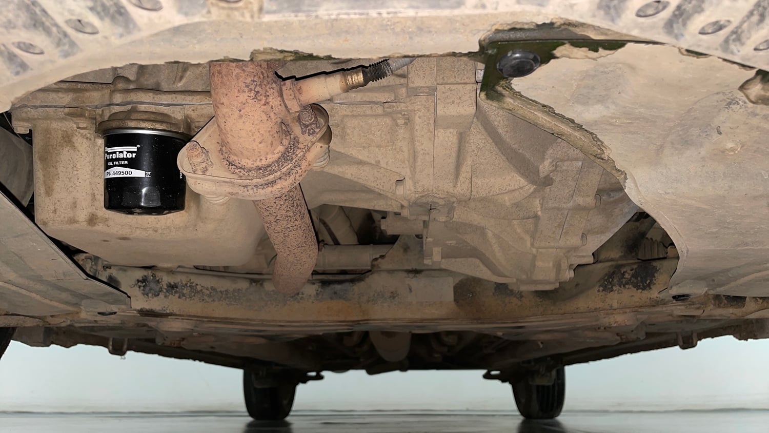 Used 2015 Maruti Suzuki Ciaz ZXI+ Petrol Manual extra FRONT LEFT UNDERBODY VIEW
