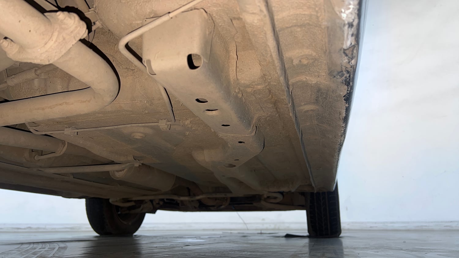 Used 2022 Tata Tigor XZ Plus CNG Cng Manual extra REAR RIGHT UNDERBODY VIEW