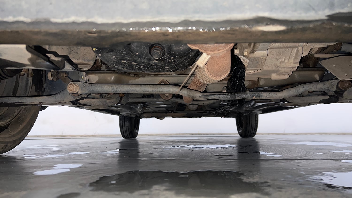 Used 2024 Tata Tiago XE Petrol Manual extra FRONT LEFT UNDERBODY VIEW