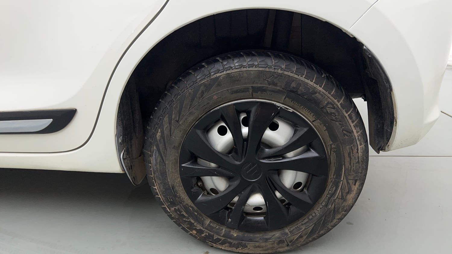 Used 2022 Maruti Suzuki Swift LXi Petrol Manual tyres LEFT REAR TYRE RIM VIEW