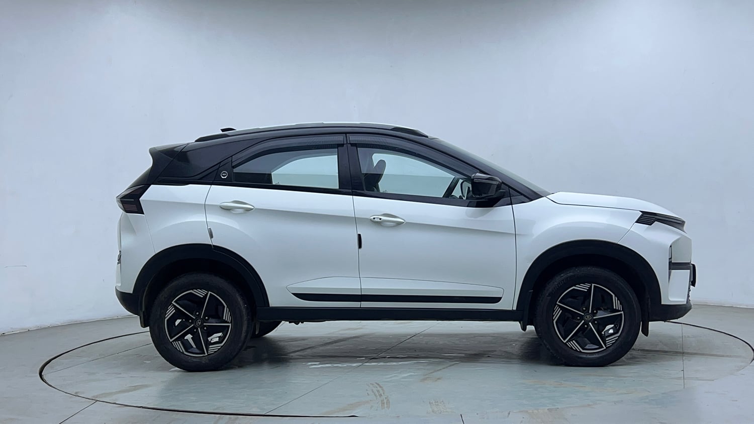 Used 2023 Tata Nexon Fearless Plus S 1.2 Revotron Petrol 7DCA DT Petrol Automatic exterior RIGHT SIDE VIEW