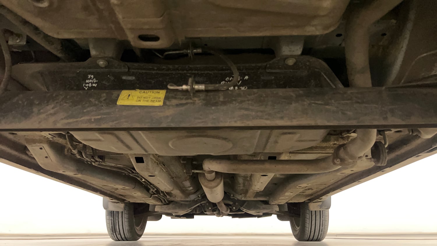 Used 2024 Tata Nexon Creative Plus S 1.2 Revotron Petrol 7DCA Petrol Automatic extra REAR UNDERBODY VIEW (TAKEN FROM REAR)