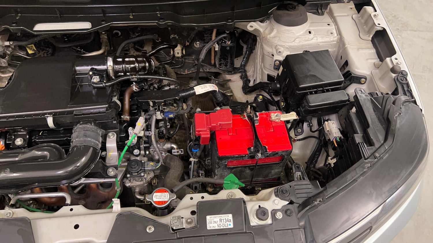 Used 2023 Maruti Suzuki Brezza VXi Petrol Manual engine ENGINE LEFT SIDE VIEW
