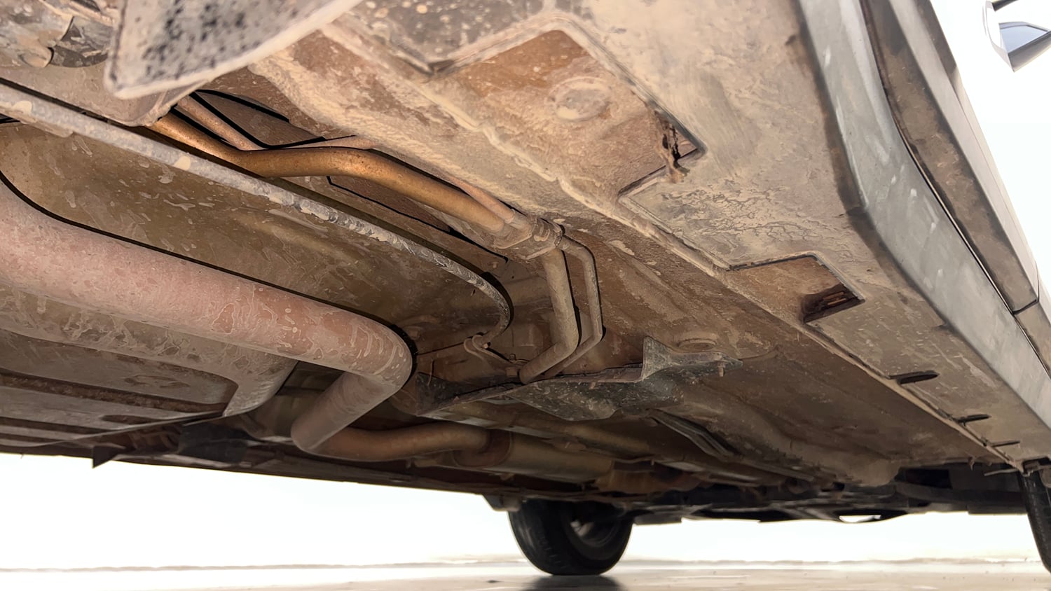 Used 2022 Kia Carens Prestige Plus 1.4 Petrol MT 7 STR Petrol Manual extra REAR RIGHT UNDERBODY VIEW