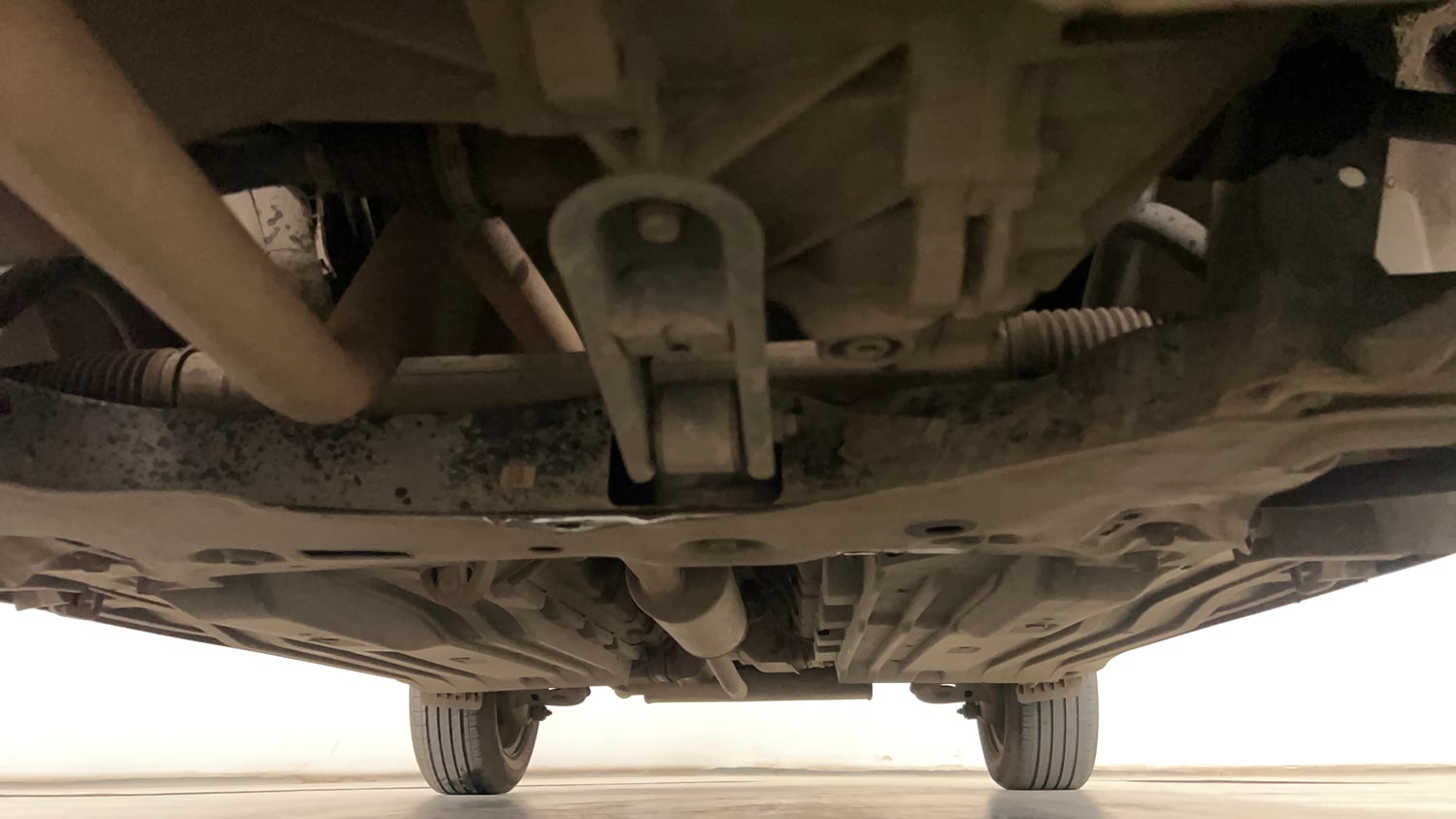 Used 2023 Maruti Suzuki Brezza VXi Petrol Manual extra FRONT LEFT UNDERBODY VIEW