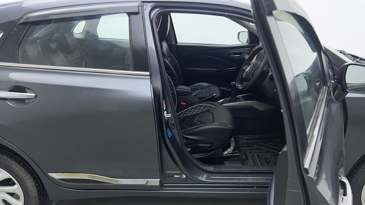 Used 2024 Maruti Suzuki Baleno Zeta MT Petrol Manual interior RIGHT SIDE FRONT DOOR CABIN VIEW