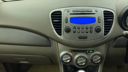 Used 2013 Hyundai i10 Sportz 1.2 AT Kappa2 Petrol Automatic interior MUSIC SYSTEM & AC CONTROL VIEW