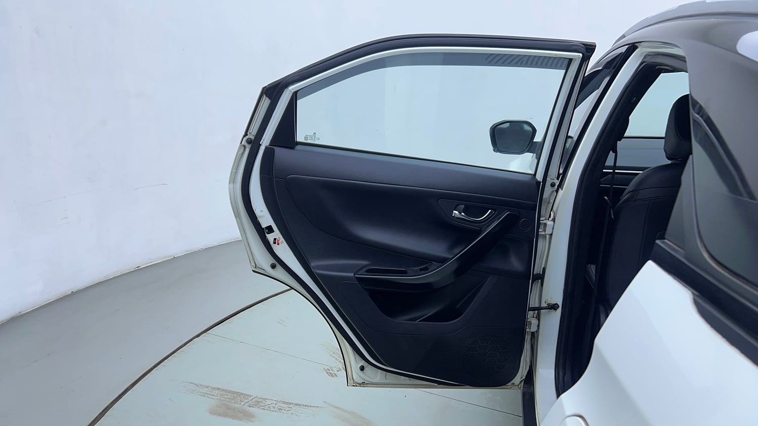 Used 2023 Tata Nexon Fearless Plus S 1.2 Revotron Petrol 7DCA DT Petrol Automatic interior LEFT REAR DOOR OPEN VIEW