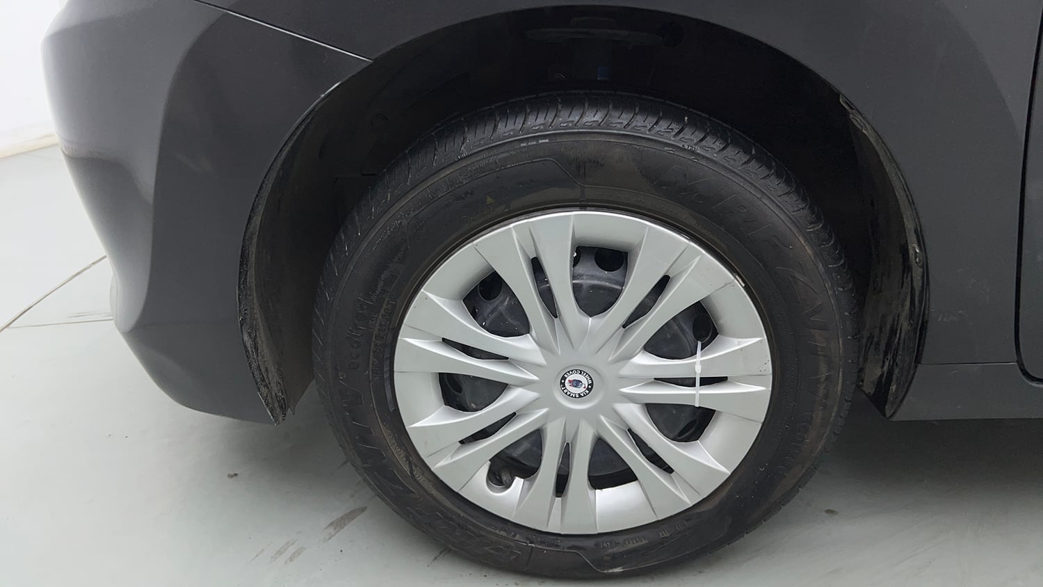 Used 2017 Maruti Suzuki Baleno Delta 1.2 Petrol Manual tyres LEFT FRONT TYRE RIM VIEW