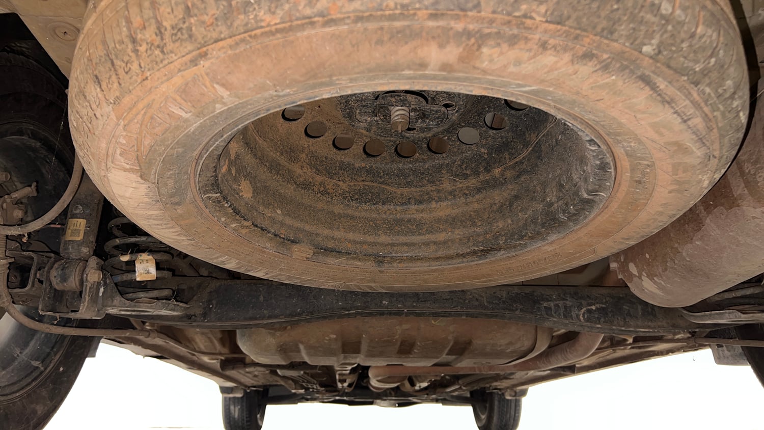 Used 2022 Kia Carens Prestige Plus 1.4 Petrol MT 7 STR Petrol Manual extra REAR UNDERBODY VIEW (TAKEN FROM REAR)