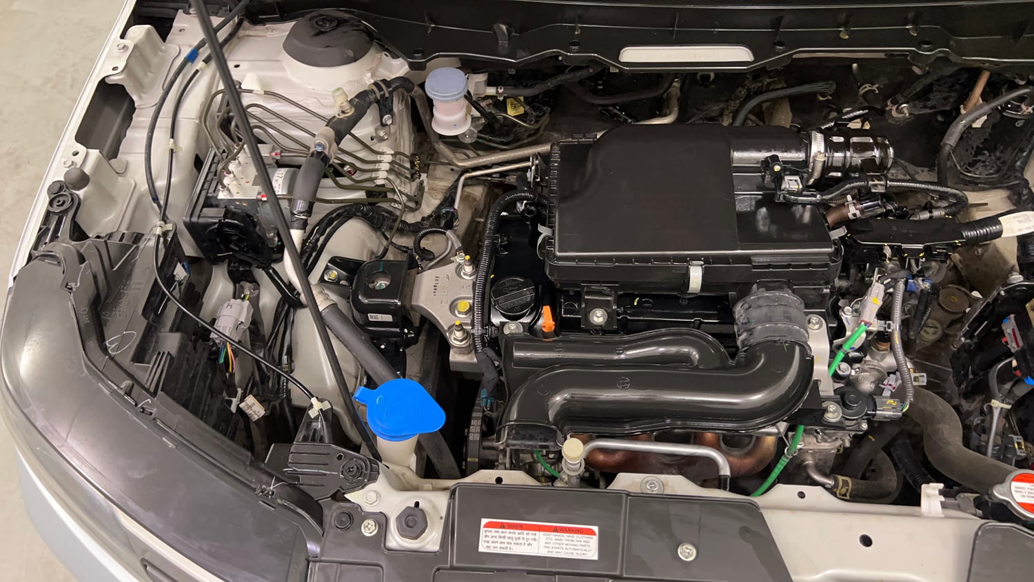 Used 2023 Maruti Suzuki Brezza VXi Petrol Manual engine ENGINE RIGHT SIDE VIEW