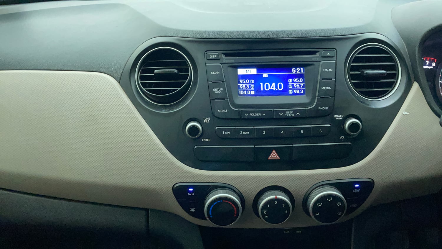 Used 2015 Hyundai Grand i10 Sportz 1.2 Kappa VTVT Petrol Manual interior MUSIC SYSTEM & AC CONTROL VIEW