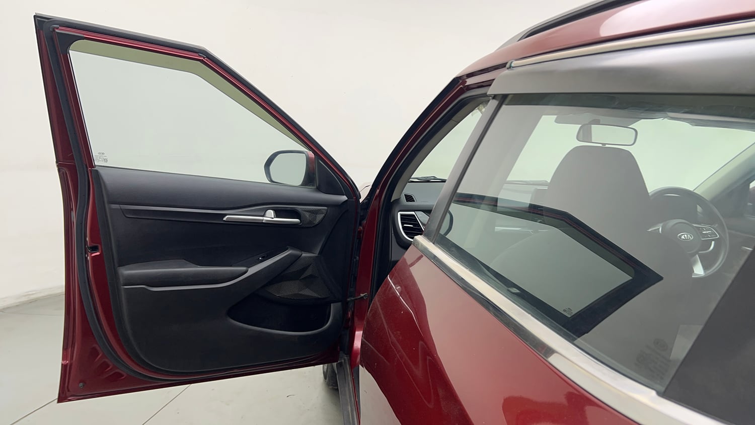 Used 2020 Kia Seltos HTK Plus 1.5 Petrol Manual interior LEFT FRONT DOOR OPEN VIEW