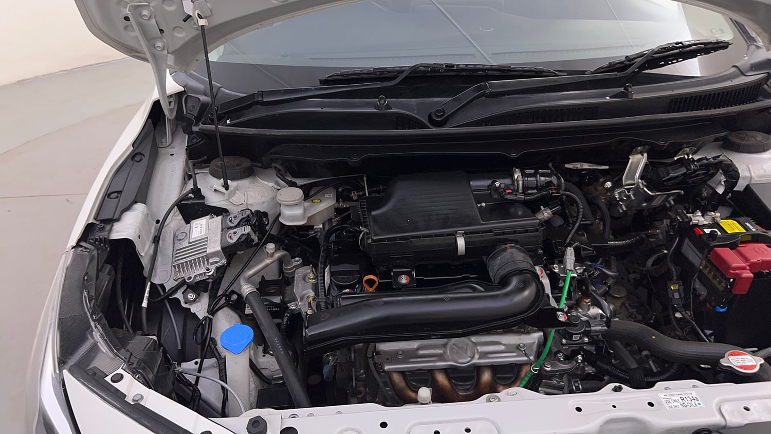 Used 2026 Maruti Suzuki Baleno Zeta MT CNG Cng Manual engine ENGINE RIGHT SIDE HINGE & APRON VIEW