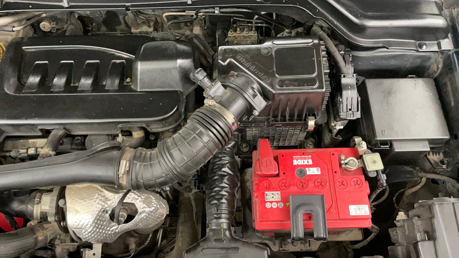 Used 2023 Mahindra XUV 300 W8 (O) 1.5 Diesel AMT Diesel Automatic engine ENGINE LEFT SIDE VIEW