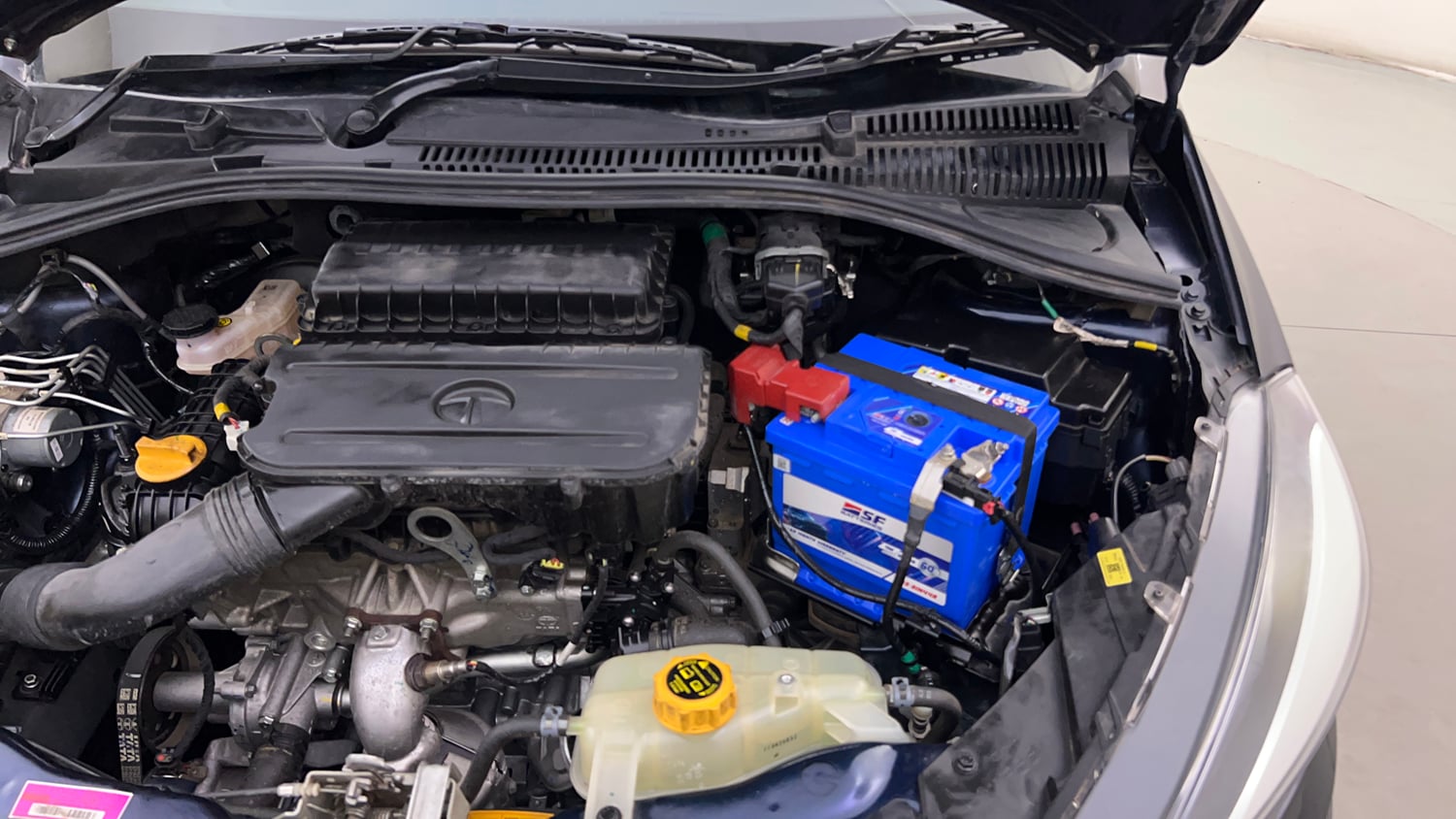Used 2023 Tata Tiago XZA Plus Petrol Automatic engine ENGINE LEFT SIDE HINGE & APRON VIEW
