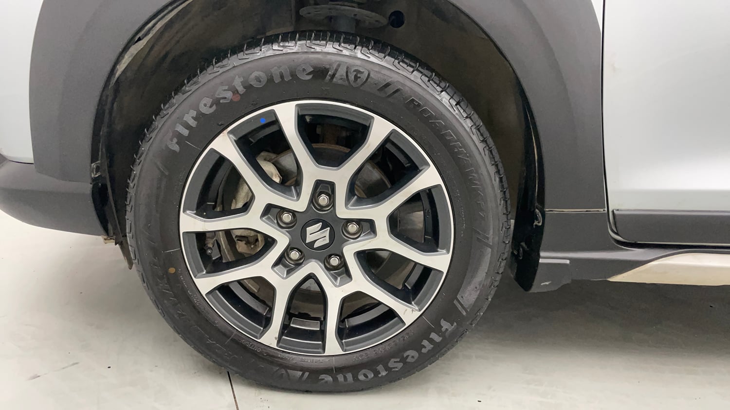 Used 2023 Maruti Suzuki XL6 Zeta MT Petrol Petrol Manual tyres LEFT FRONT TYRE RIM VIEW