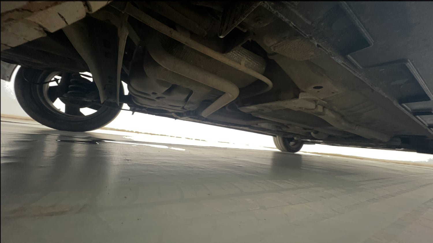 Used 2024 Hyundai New i20 Asta (O) 1.2 IVT Petrol Automatic extra REAR RIGHT UNDERBODY VIEW