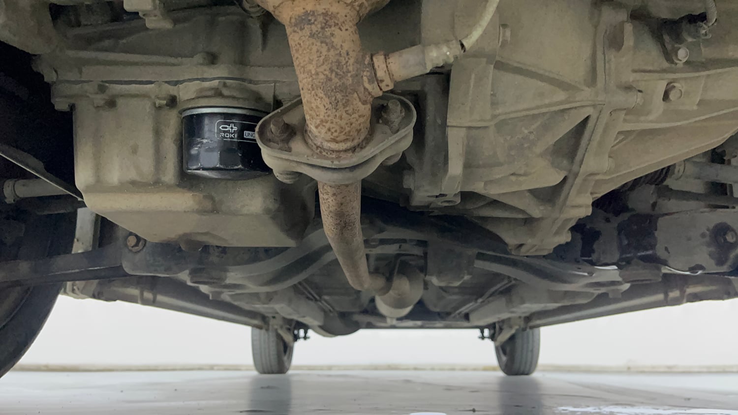 Used 2020 Maruti Suzuki Wagon R 1.0 VXI AMT Petrol Automatic extra FRONT LEFT UNDERBODY VIEW