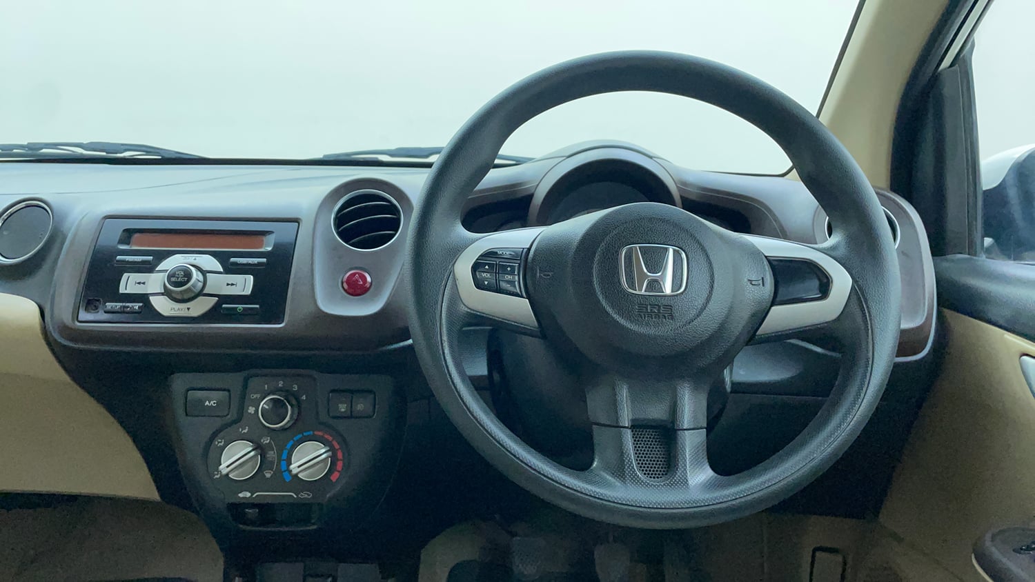 Used 2013 Honda Brio VX MT Petrol Manual interior STEERING VIEW