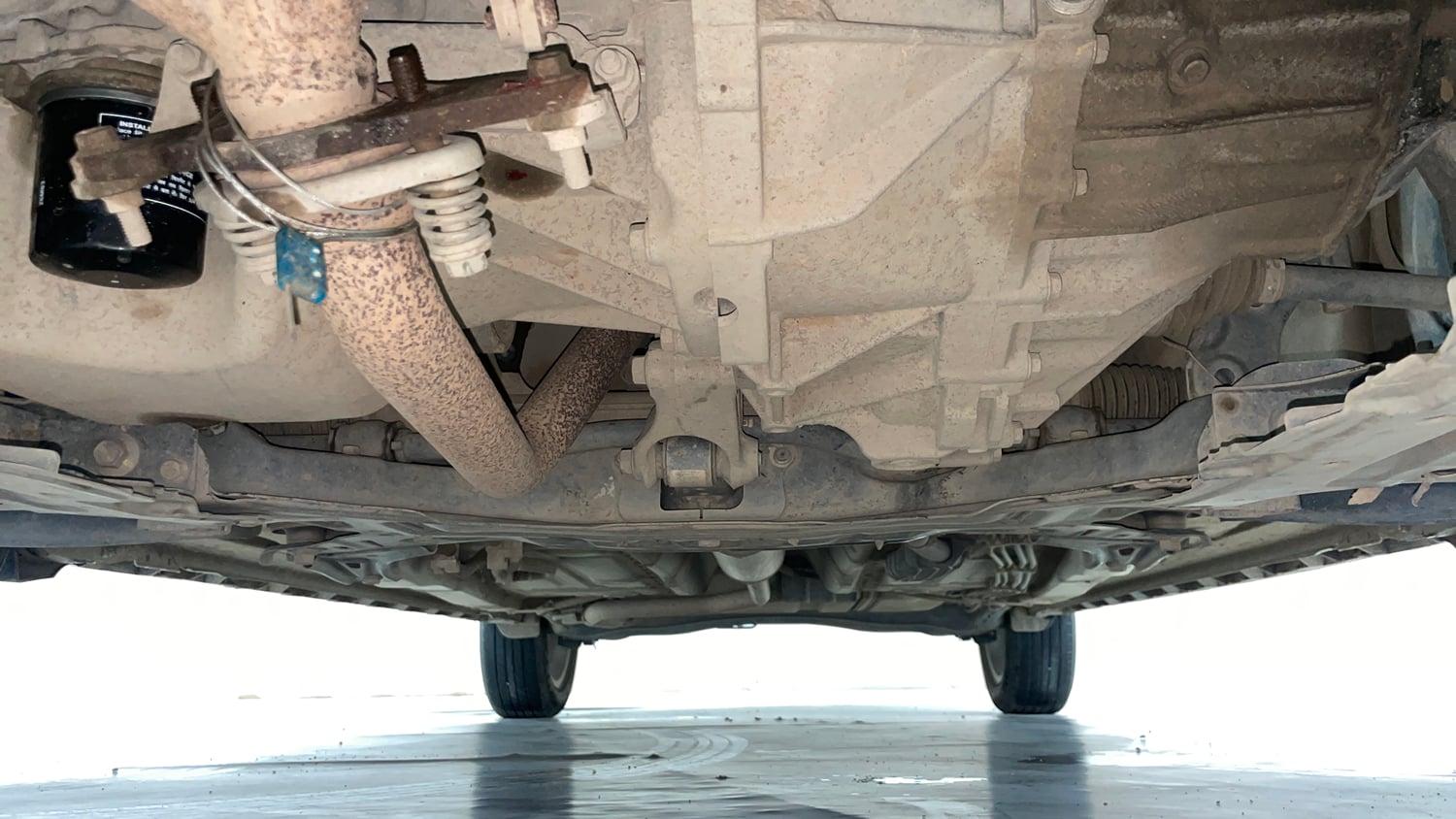 Used 2023 Maruti Suzuki XL6 Zeta MT Petrol Petrol Manual extra FRONT LEFT UNDERBODY VIEW