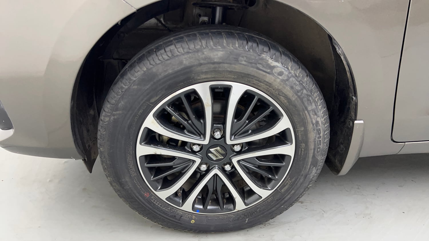 Used 2023 Maruti Suzuki Ertiga ZXi Plus Petrol Manual tyres LEFT FRONT TYRE RIM VIEW