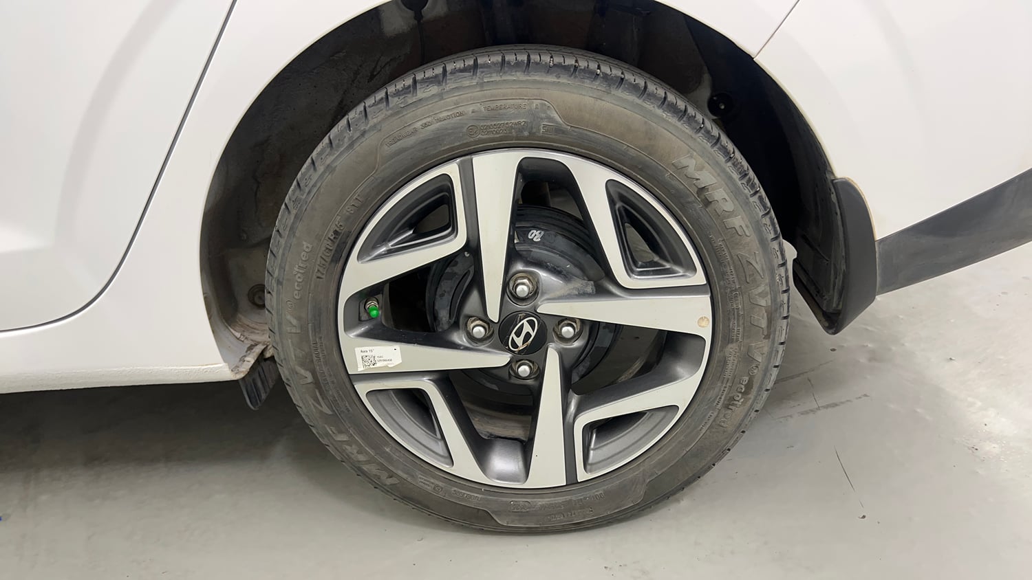 Used 2025 Hyundai Aura SX 1.2 CNG Cng Manual tyres LEFT REAR TYRE RIM VIEW