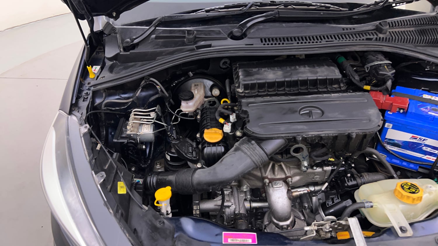Used 2023 Tata Tiago XZA Plus Petrol Automatic engine ENGINE RIGHT SIDE HINGE & APRON VIEW