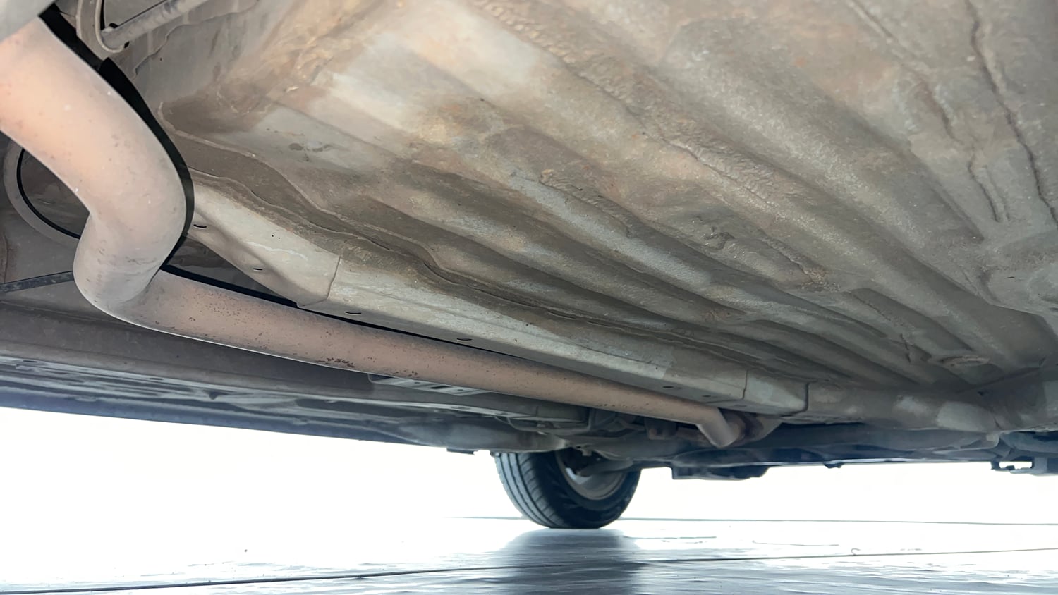 Used 2023 Honda Amaze VX 1.2 Petrol MT Petrol Manual extra REAR RIGHT UNDERBODY VIEW
