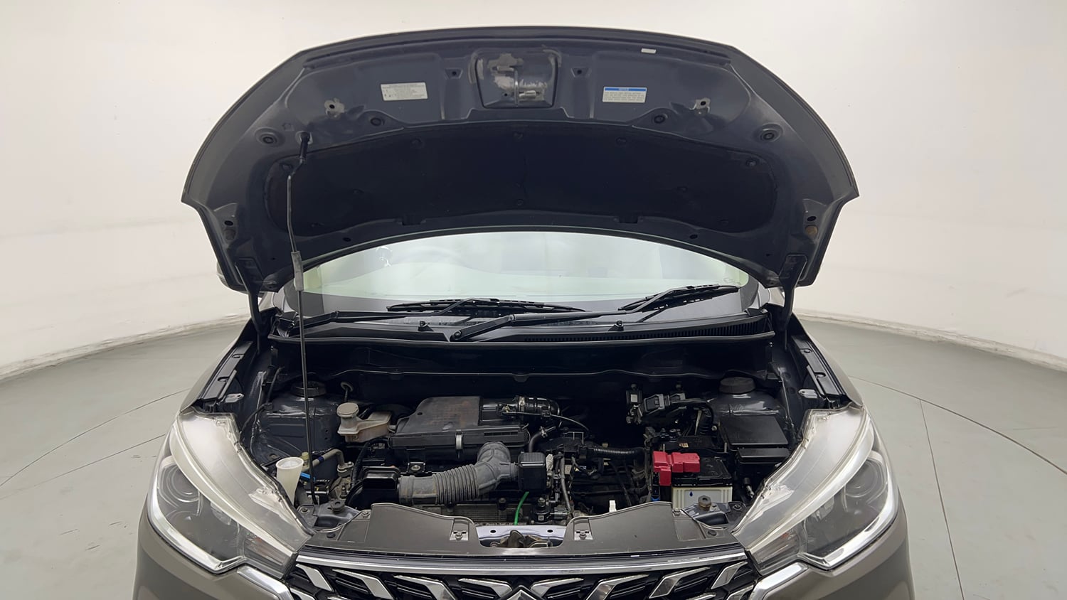 Used 2023 Maruti Suzuki Ertiga ZXi Plus Petrol Manual engine ENGINE & BONNET OPEN FRONT VIEW