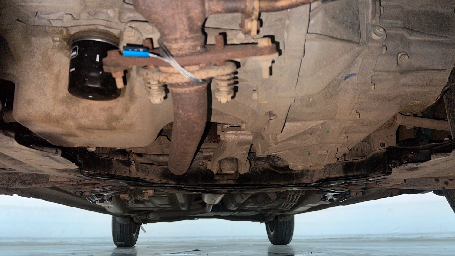 Used 2023 Maruti Suzuki Ertiga ZXi Plus Petrol Manual extra FRONT LEFT UNDERBODY VIEW