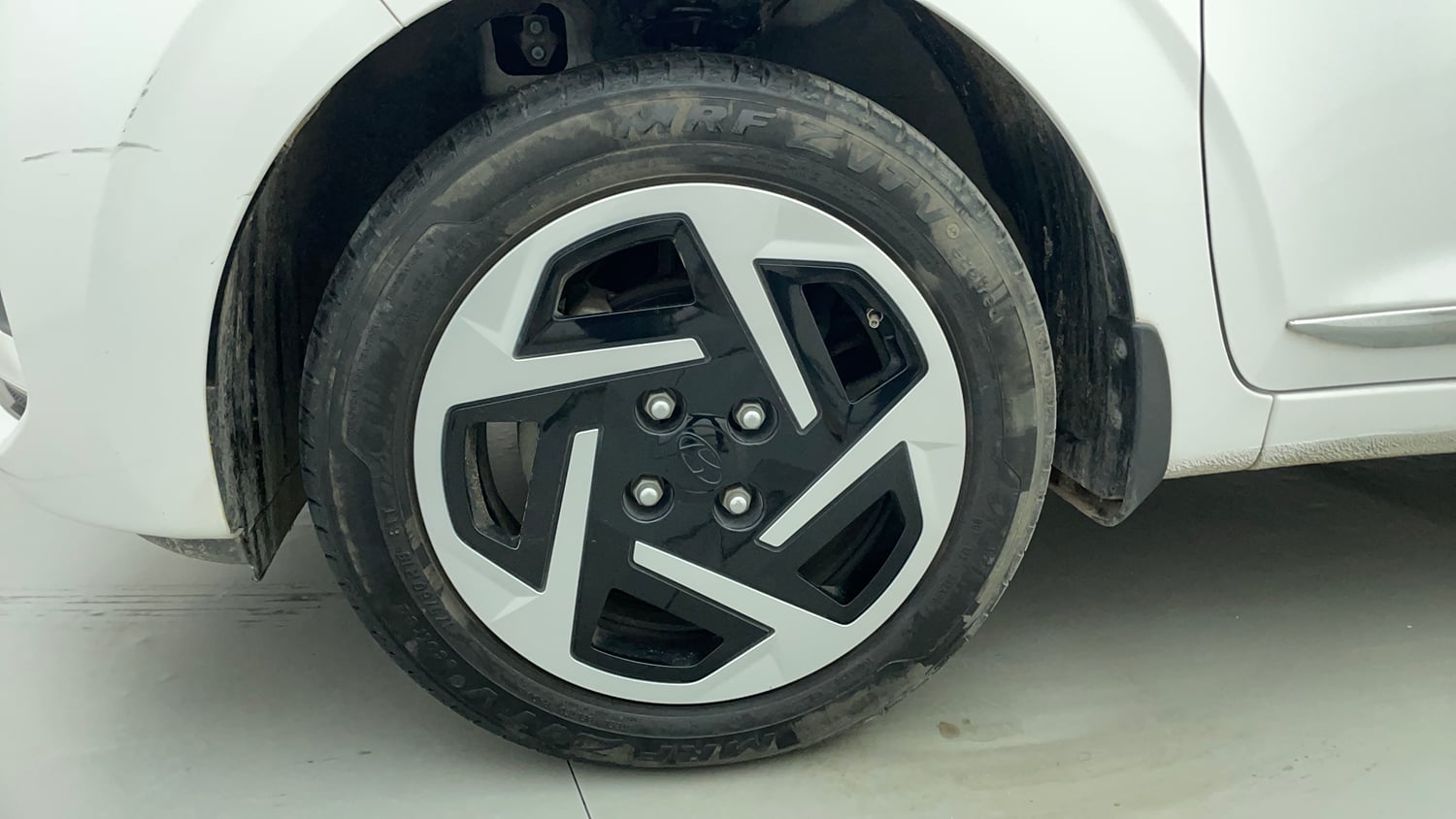 Used 2024 Hyundai Grand i10 Nios Sportz 1.2 Kappa VTVT Petrol Manual tyres LEFT FRONT TYRE RIM VIEW