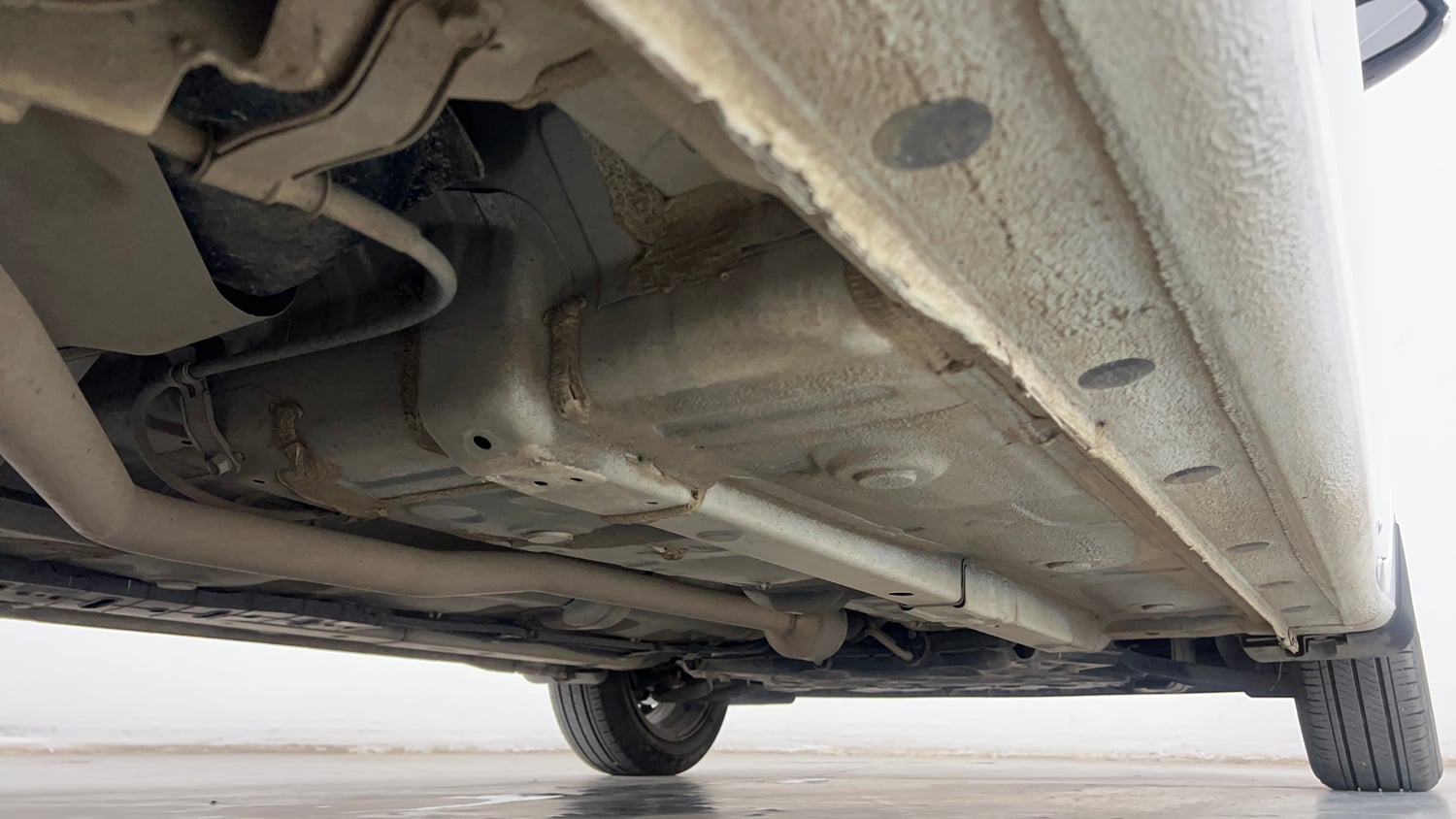 Used 2025 Hyundai Aura SX 1.2 CNG Cng Manual extra REAR RIGHT UNDERBODY VIEW