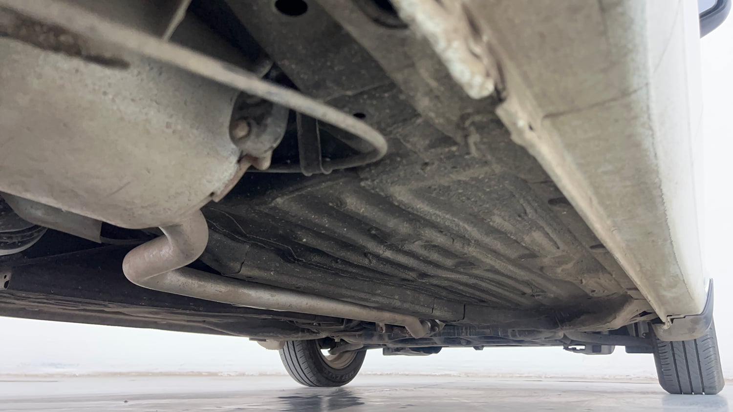 Used 2019 Honda Amaze 1.2 VX MT Petrol Petrol Manual extra REAR RIGHT UNDERBODY VIEW