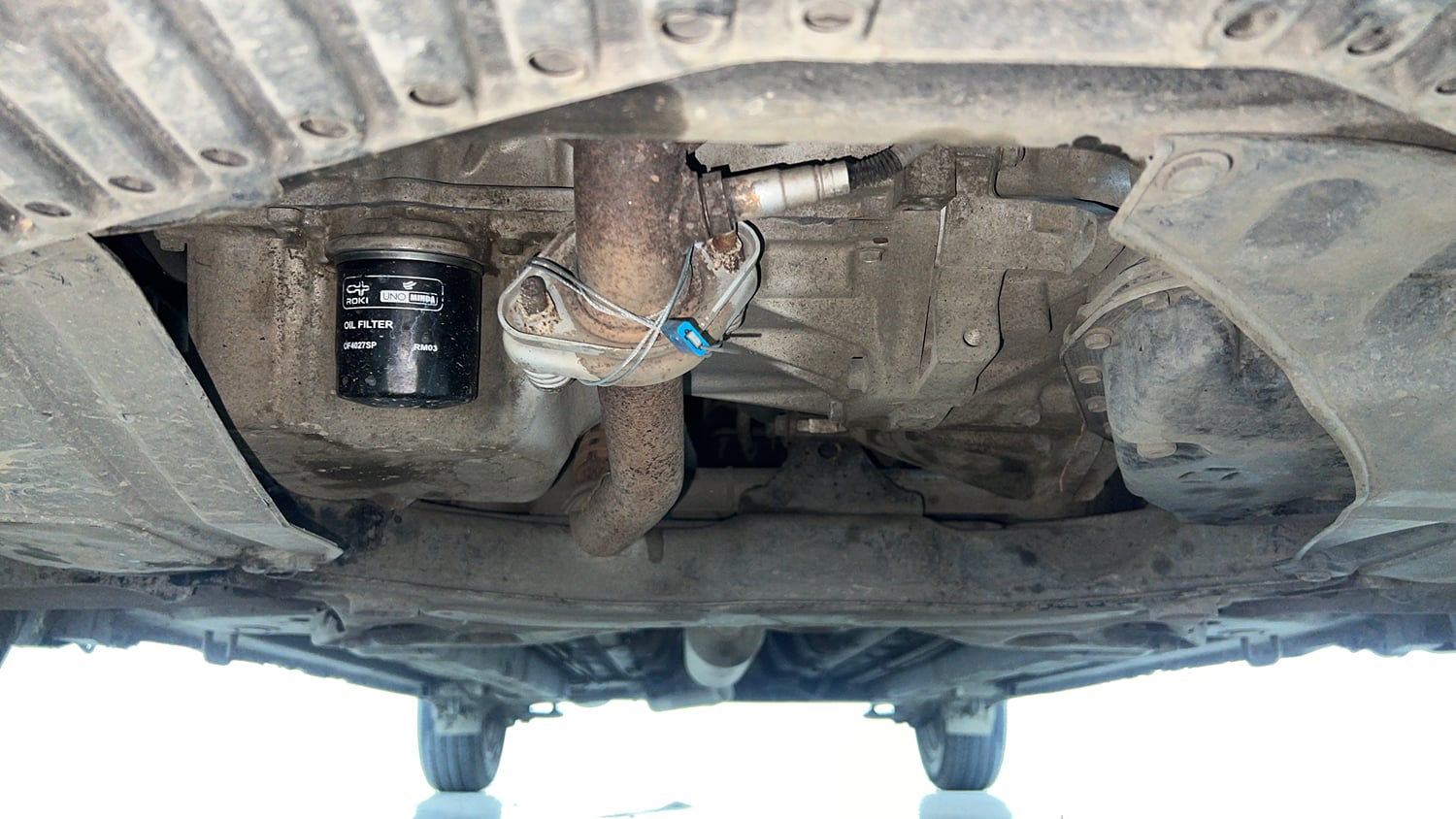 Used 2015 Maruti Suzuki Ciaz ZXi  AT Petrol Automatic extra FRONT LEFT UNDERBODY VIEW