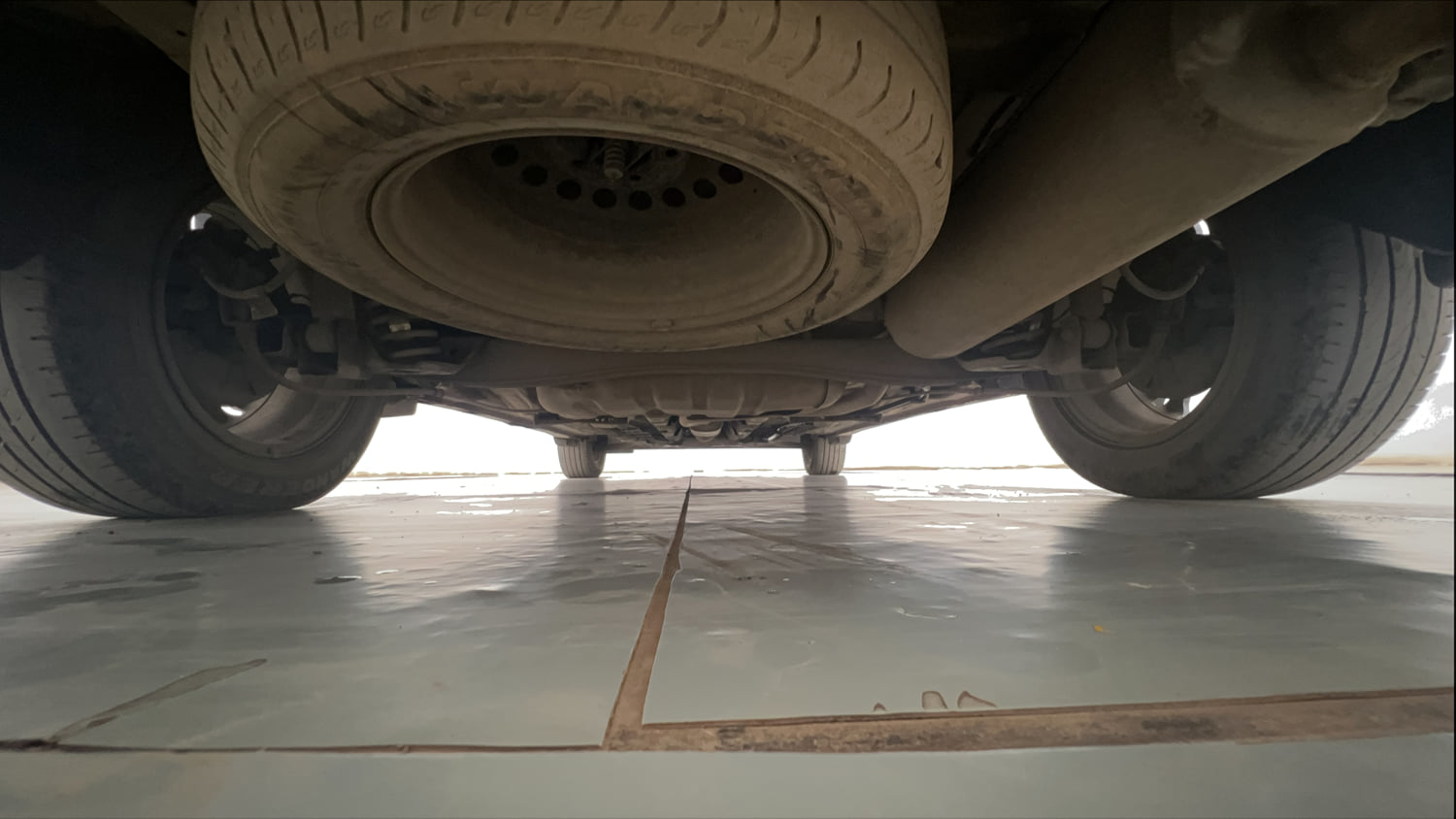 Used 2022 Kia Carens Luxury 1.4 Petrol 7 STR Petrol Manual extra REAR UNDERBODY VIEW (TAKEN FROM REAR)