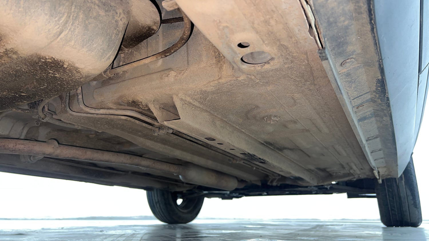 Used 2021 Nissan Magnite XE Petrol Manual extra REAR RIGHT UNDERBODY VIEW