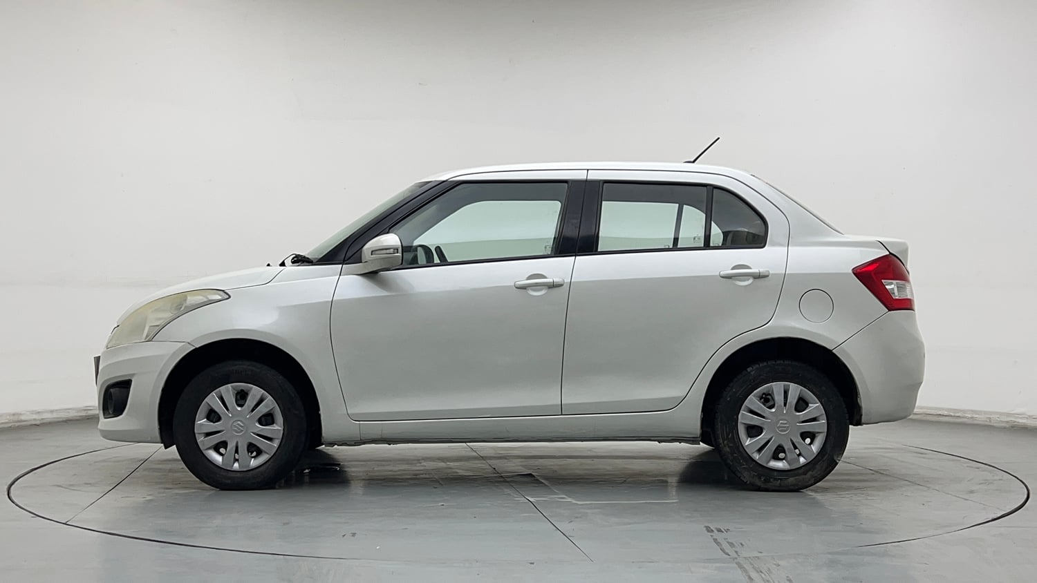 Used 2013 Maruti Suzuki Swift Dzire VXI Petrol Manual exterior LEFT SIDE VIEW