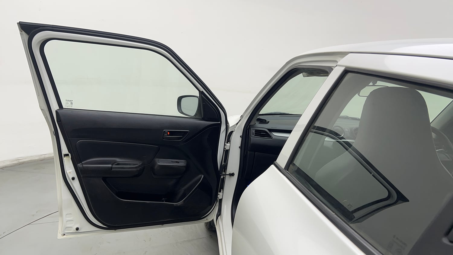 Used 2019 Maruti Suzuki Swift LXi Petrol Manual interior LEFT FRONT DOOR OPEN VIEW