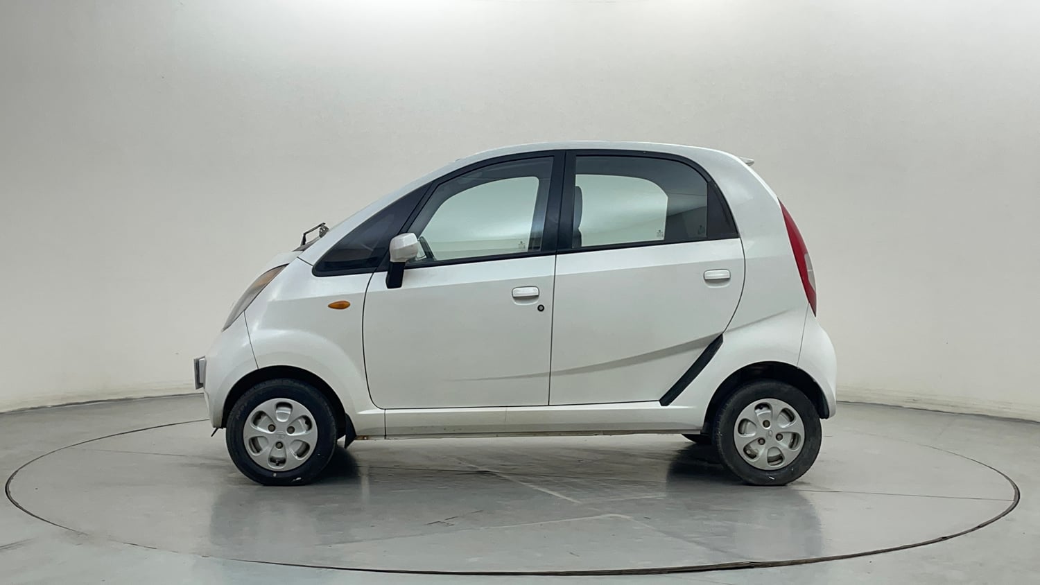 Used 2012 Tata Nano LX Petrol Manual exterior LEFT SIDE VIEW