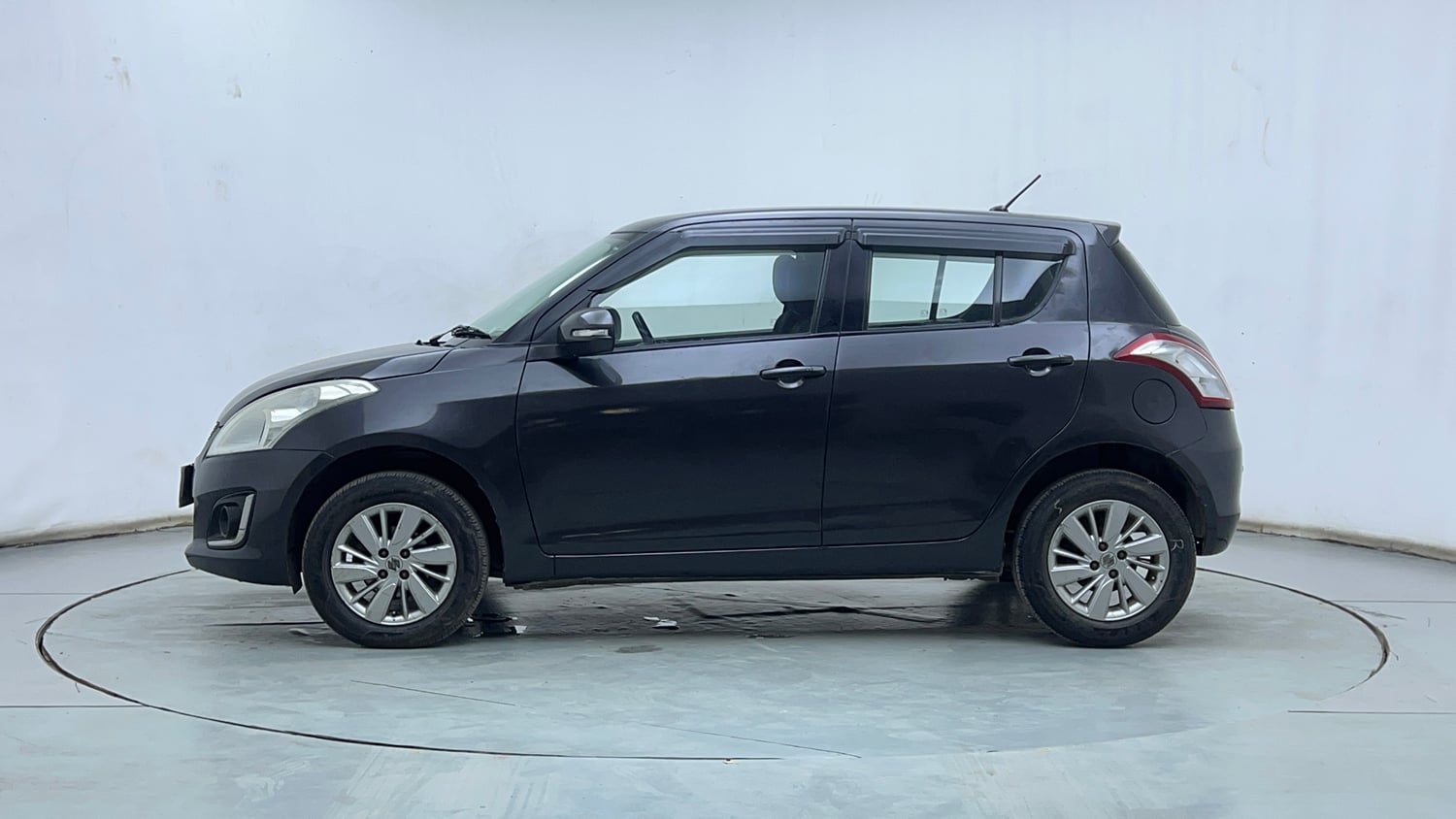 Used 2015 Maruti Suzuki Swift ZXi Petrol Manual exterior LEFT SIDE VIEW